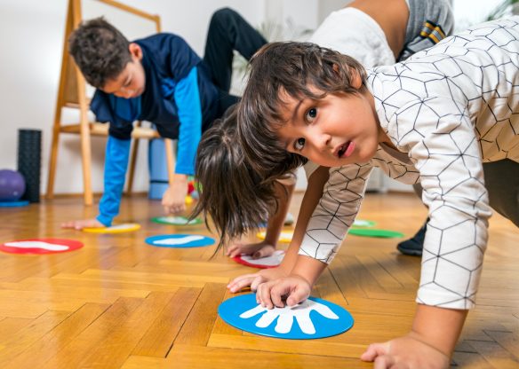 group-of-children-playing-twister-indoors.jpg